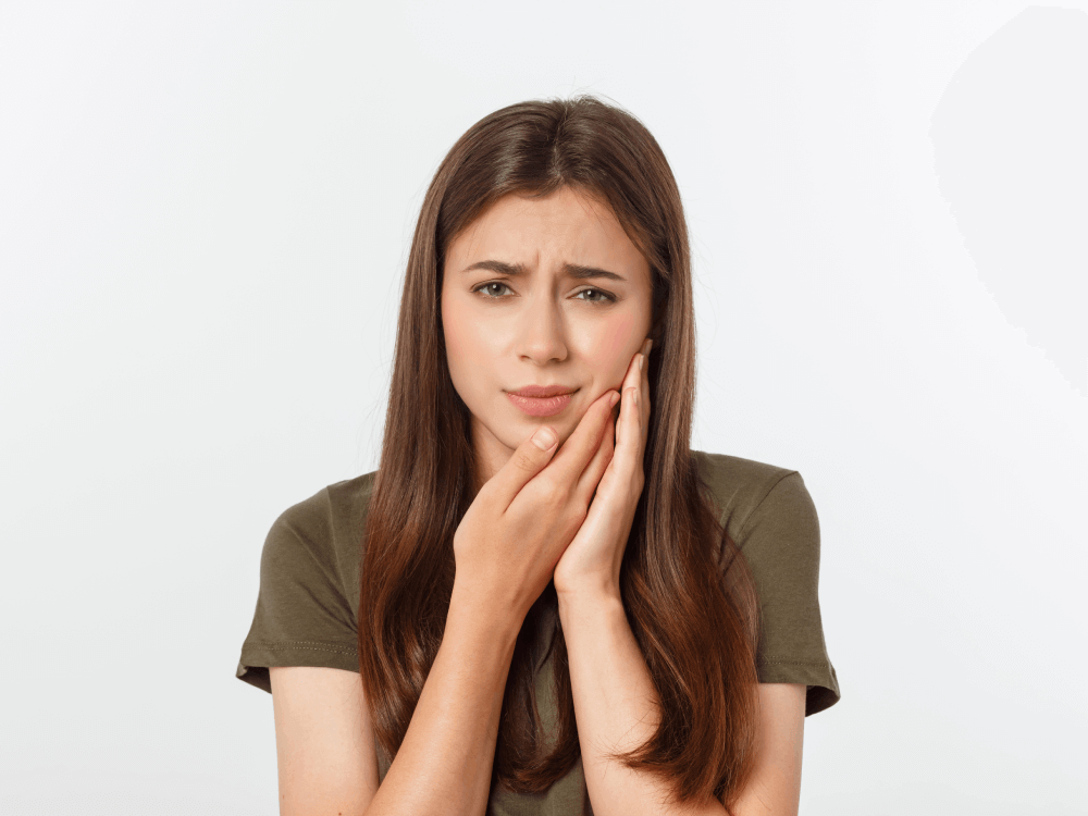 Woman with a tooth abscess in pain